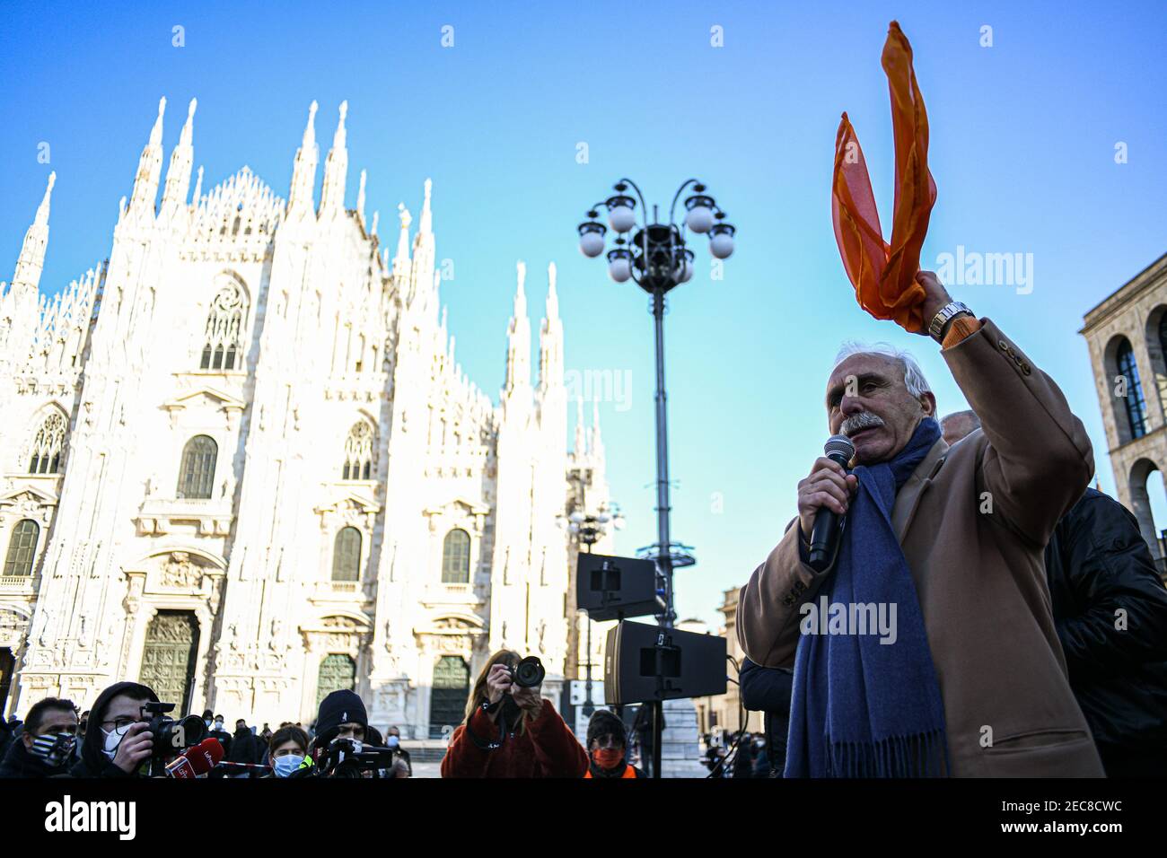 Milan, Italy. 13th Feb, 2021. Retired general Antonio Pappalardo, speaks during an Orange Vests (Gilet Arancio) rally in Piazza Duomo in Milan, Italy on 13 February 2021 Credit: Piero Cruciatti/Alamy Live News Stock Photo