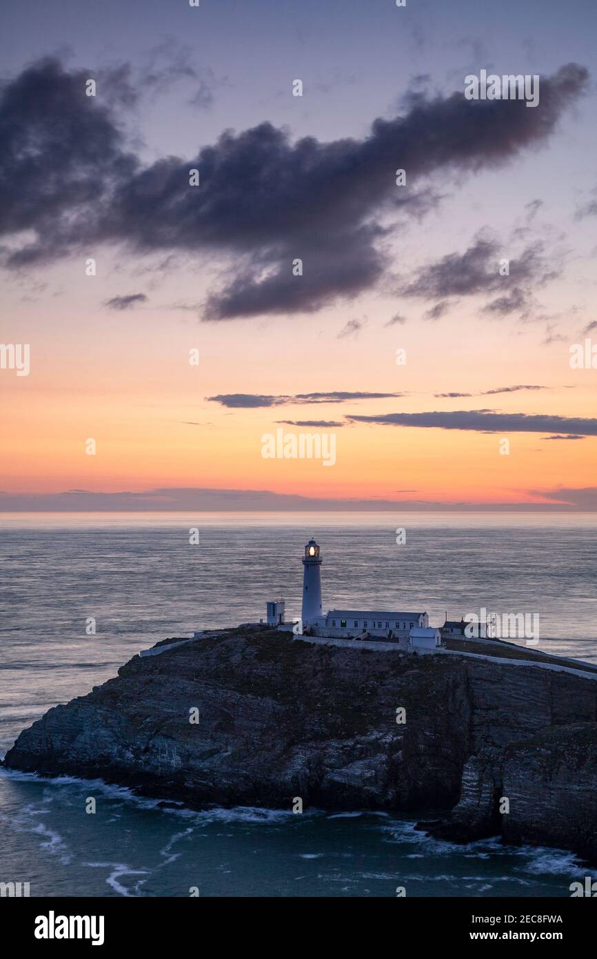 South Stack lighthouse at sunset, Anglesey on the North Wales coast Stock Photo