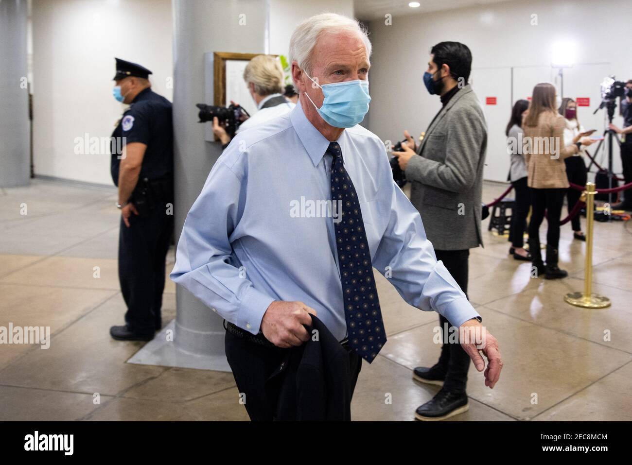 Senator Ron Johnson, R-WI, walks on Capitol Hill in Washington, Saturday, Feb. 13, 2021, before the fifth day of the second impeachment trial of former President Donald Trump. Stock Photo