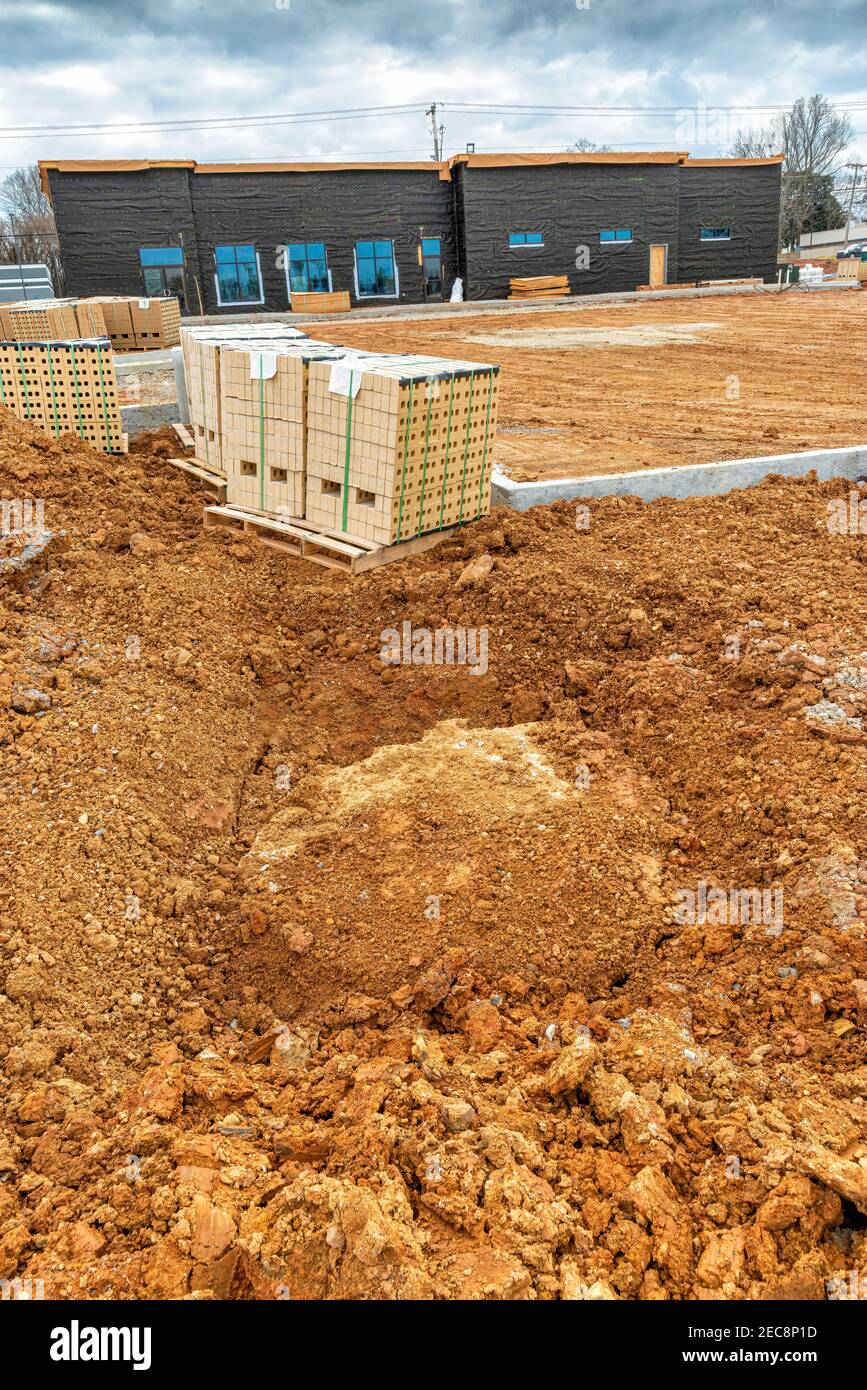Vertical shot of a new construction project site Stock Photo - Alamy