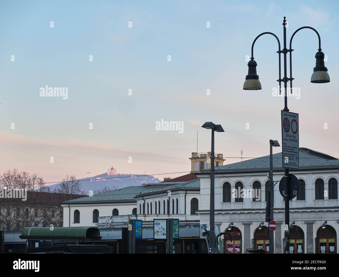 Turin, Italy - February 2021: cityscape of the popular district with a view of the Basilica of Superga in the background Stock Photo