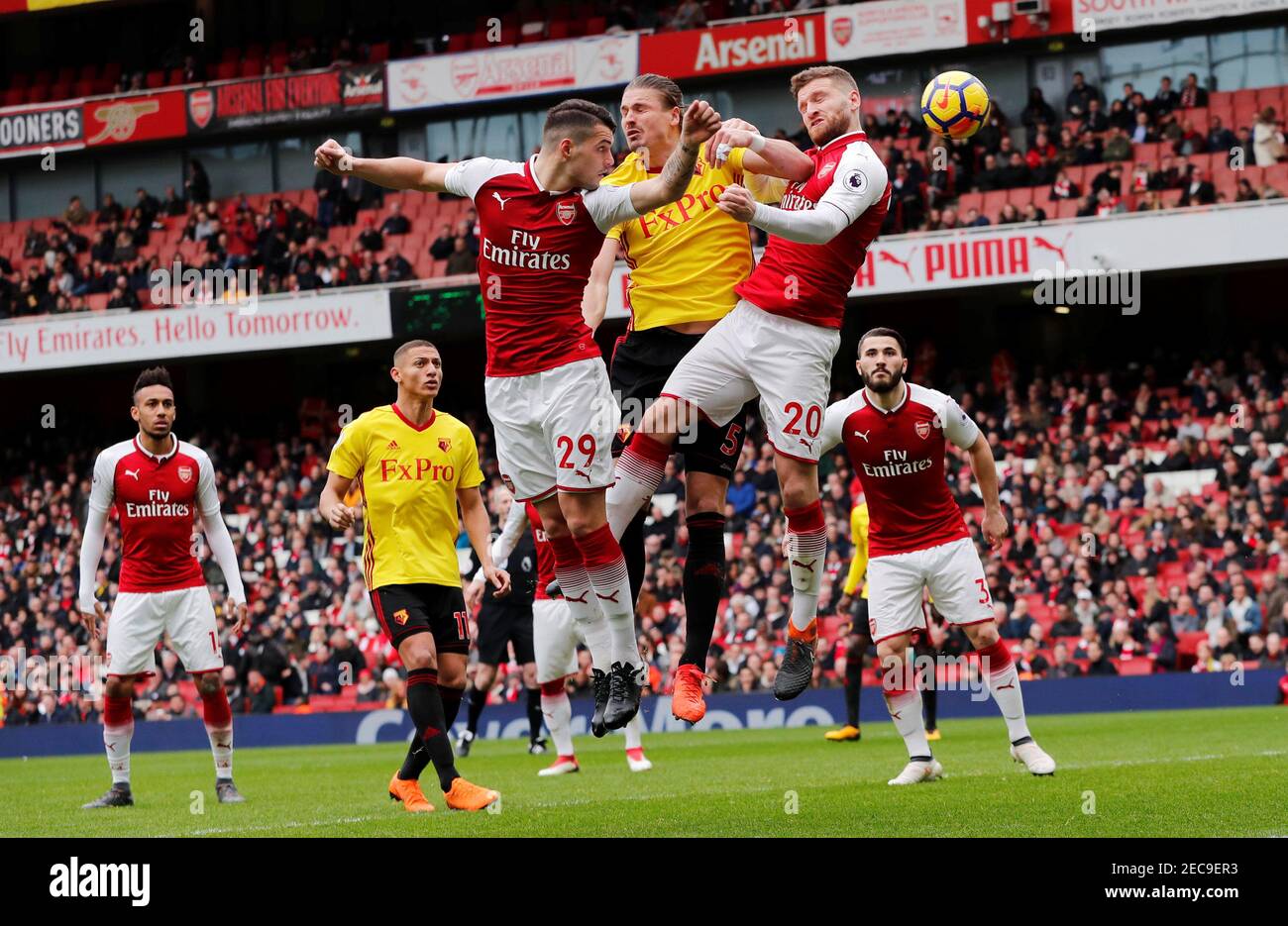 Soccer Football - Premier League - Arsenal vs Watford - Emirates Stadium, London, Britain - March 11, 2018   Arsenal's Granit Xhaka and Shkodran Mustafi in action with Watford's Sebastian Prodl    REUTERS/Eddie Keogh    EDITORIAL USE ONLY. No use with unauthorized audio, video, data, fixture lists, club/league logos or 'live' services. Online in-match use limited to 75 images, no video emulation. No use in betting, games or single club/league/player publications.  Please contact your account representative for further details. Stock Photo