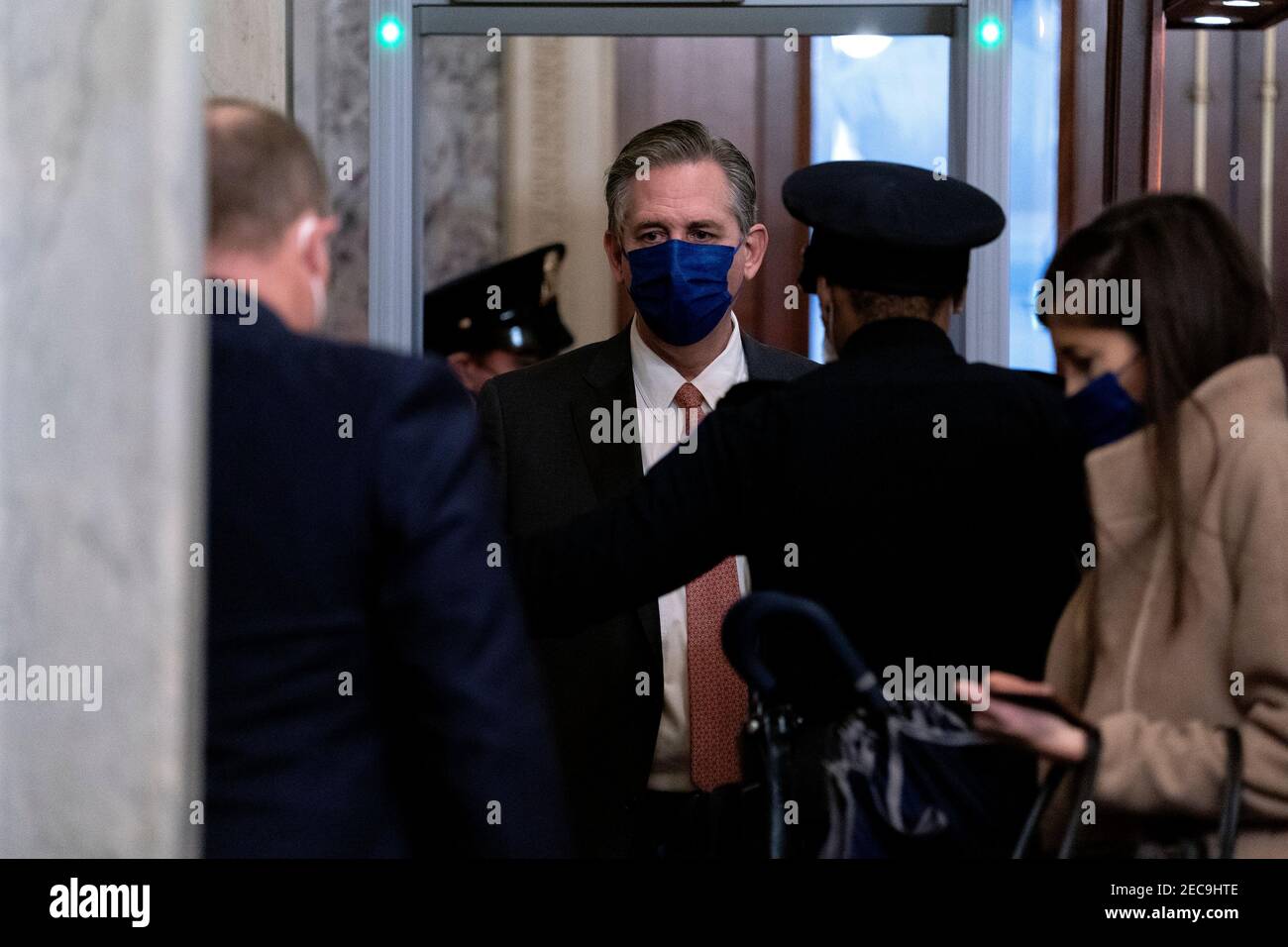 Washington, DC, USA. 13th Feb, 2021. Bruce Castor, defense attorney for Donald Trump, center, goes through security while arriving to the U.S. Capitol in Washington, DC, U.S., on Saturday, Feb. 13, 2021. The Senate approved 55-45 a request to consider calling witnesses in the second impeachment trial of Donald Trump, a move that may extend the trial that was expected to end within hours. Credit: Stefani Reynolds - Pool via CNP | usage worldwide Credit: dpa/Alamy Live News Stock Photo