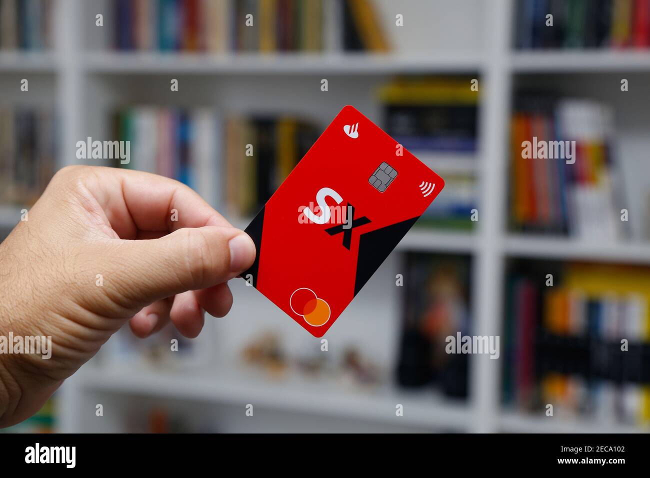 Minas Gerais, Brazil - February 13, 2021: credit card with Santander SX and Mastercard brand. Digital payment system. Stock Photo