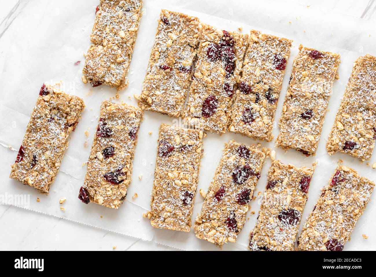 Vegan Energy Oat Bars With Coconut, Rice Puffs and Dried Cranberries Fruits, Flat Lay Stock