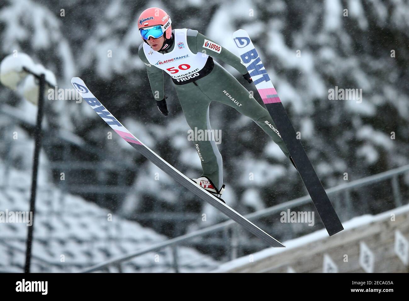 Zakopane, Poland. 13th Feb, 2021. Dawid Kubacki ski jumping on The Great Krokiew Ski Jumping facility during the Ski Jumping World Cup competition in Zakopane. Credit: SOPA Images Limited/Alamy Live News Stock Photo