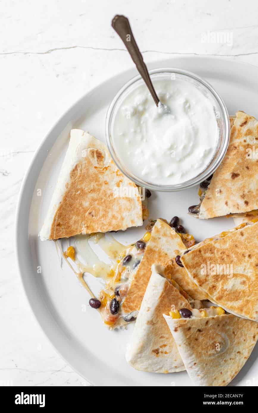 Black Bean Quesadilla, Cheese and Sour Cream Stock Photo Alamy