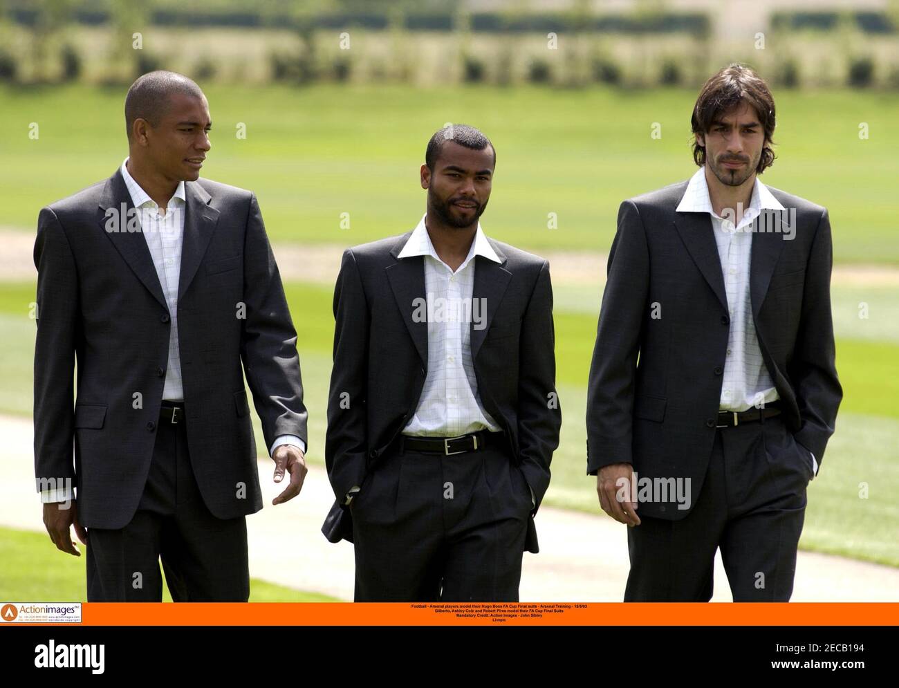 Football - Arsenal players model their Hugo Boss FA Cup Final suits -  Arsenal Training - 15/5/03 Gilberto Silva , Ashley Cole and Robert Pires  model their FA Cup Final Suits Mandatory
