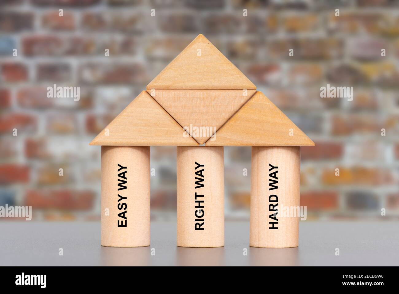 decision of right way printed on wooden pillars Stock Photo
