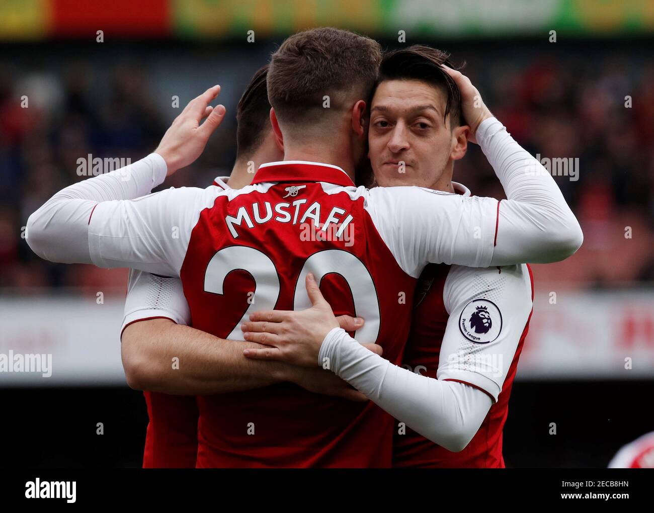 Soccer Football - Premier League - Arsenal vs Watford - Emirates Stadium, London, Britain - March 11, 2018 Arsenal's Shkodran Mustafi celebrates scoring their first goal with team mates REUTERS/Eddie Keogh EDITORIAL USE ONLY. No use with unauthorized audio, video, data, fixture lists, club/league logos or "live" services. Online in-match use limited to 75 images, no video emulation. No use in betting, games or single club/league/player publications. Please contact your account representative for further details. Stock Photo