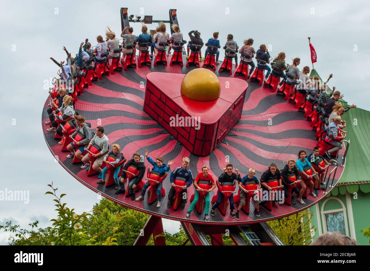 Gothenburg sweden - July 1. 2013: Young people having fun in  Hanghai which  is a swinging and spinning attraction in the Liseberg amusement park Stock Photo