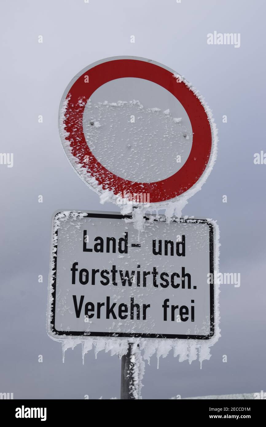 icy traffic sign Stock Photo - Alamy