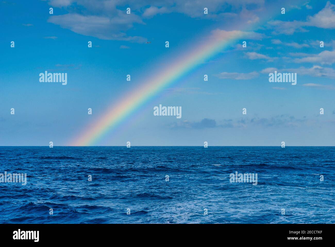 Colorful rainbow over the open Atlantic ocean Stock Photo - Alamy