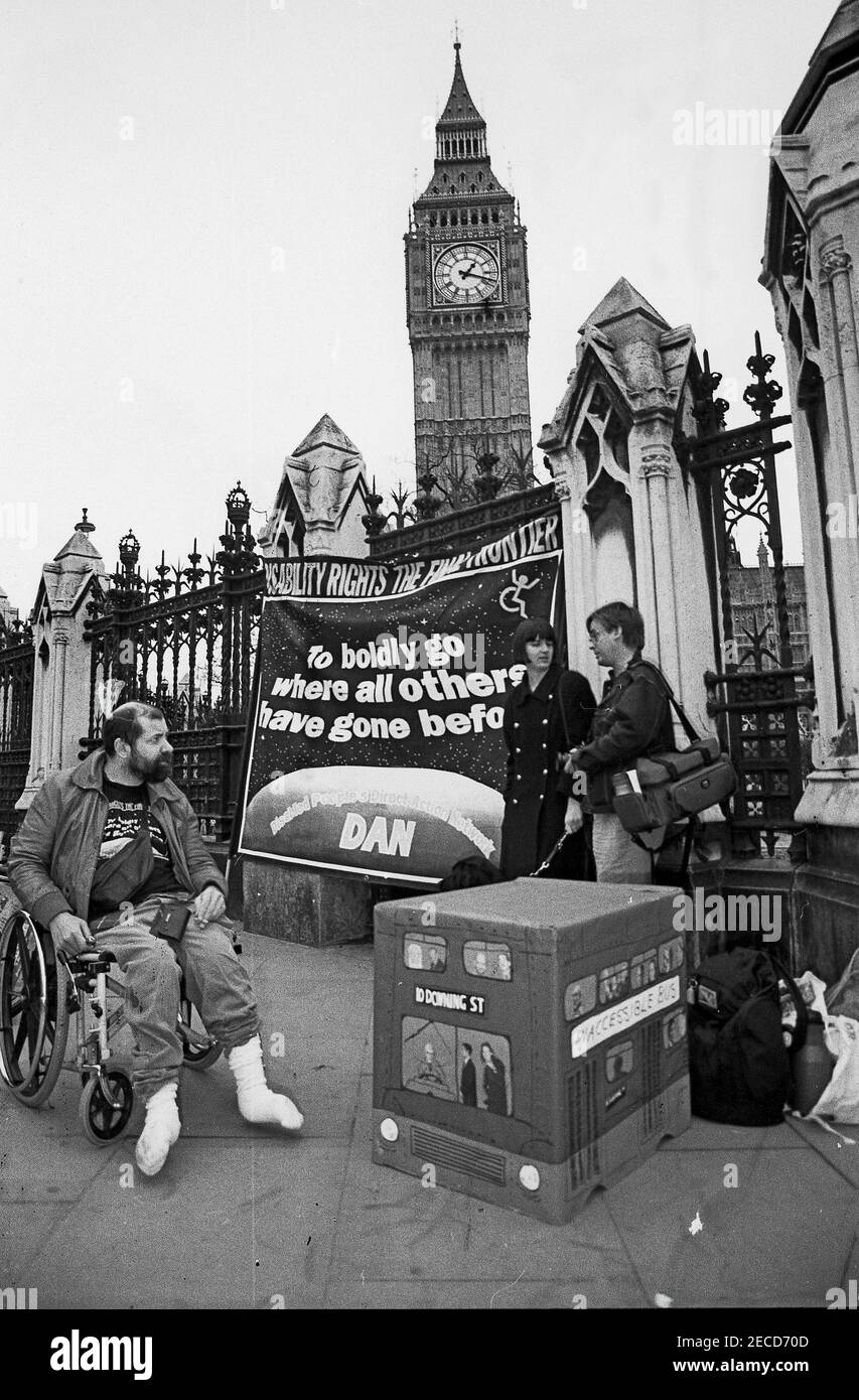 Wheelchair users from DAN (Disabled Action Network) protest outside Parliament as part of a series of protests about lack of disabled persons access to public transport, in the lead up to the Disability Discrimination Act being debated in Parliament, February 1995 Stock Photo