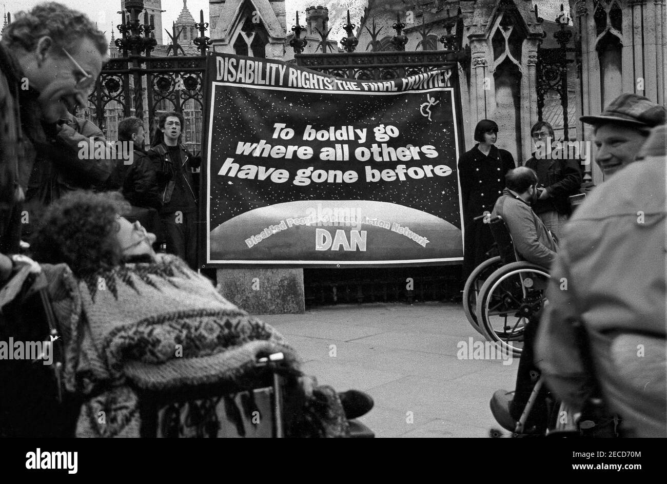 Wheelchair users from DAN (Disabled Action Network) protest outside Parliament as part of a series of protests about lack of disabled persons access to public transport, in the lead up to the Disability Discrimination Act being debated in Parliament, February 1995 Stock Photo