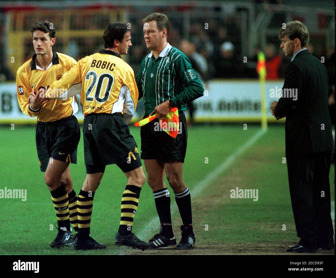 Dortmund Germany 7.11.1999, Football: Bundesliga Season 1999/2000,  Borussia Dortmund (BVB, yellow) vs Bayer 04 Leverkusen (B04, red) 1:1 - Fredi BOBIC (2nd fr. left), Heiko HERRLICH  (BVB, left) Stock Photo