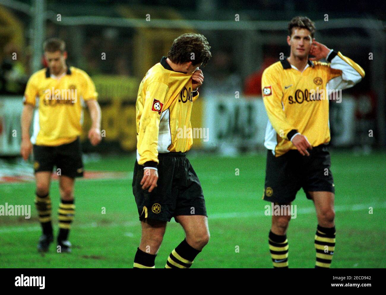 Dortmund Germany 7.11.1999, Football: Bundesliga Season 1999/2000,  Borussia Dortmund (BVB, yellow) vs Bayer 04 Leverkusen (B04, red) 1:1 - from left: RICKEN, WOERNS and HERRLICH (BVB) Stock Photo