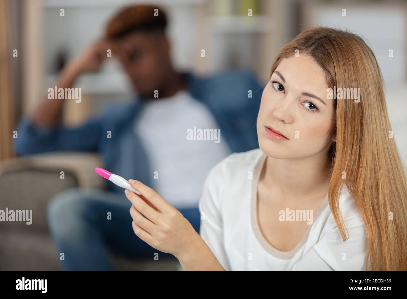 stressed couple doing pregnancy test at home Stock Photo - Alamy