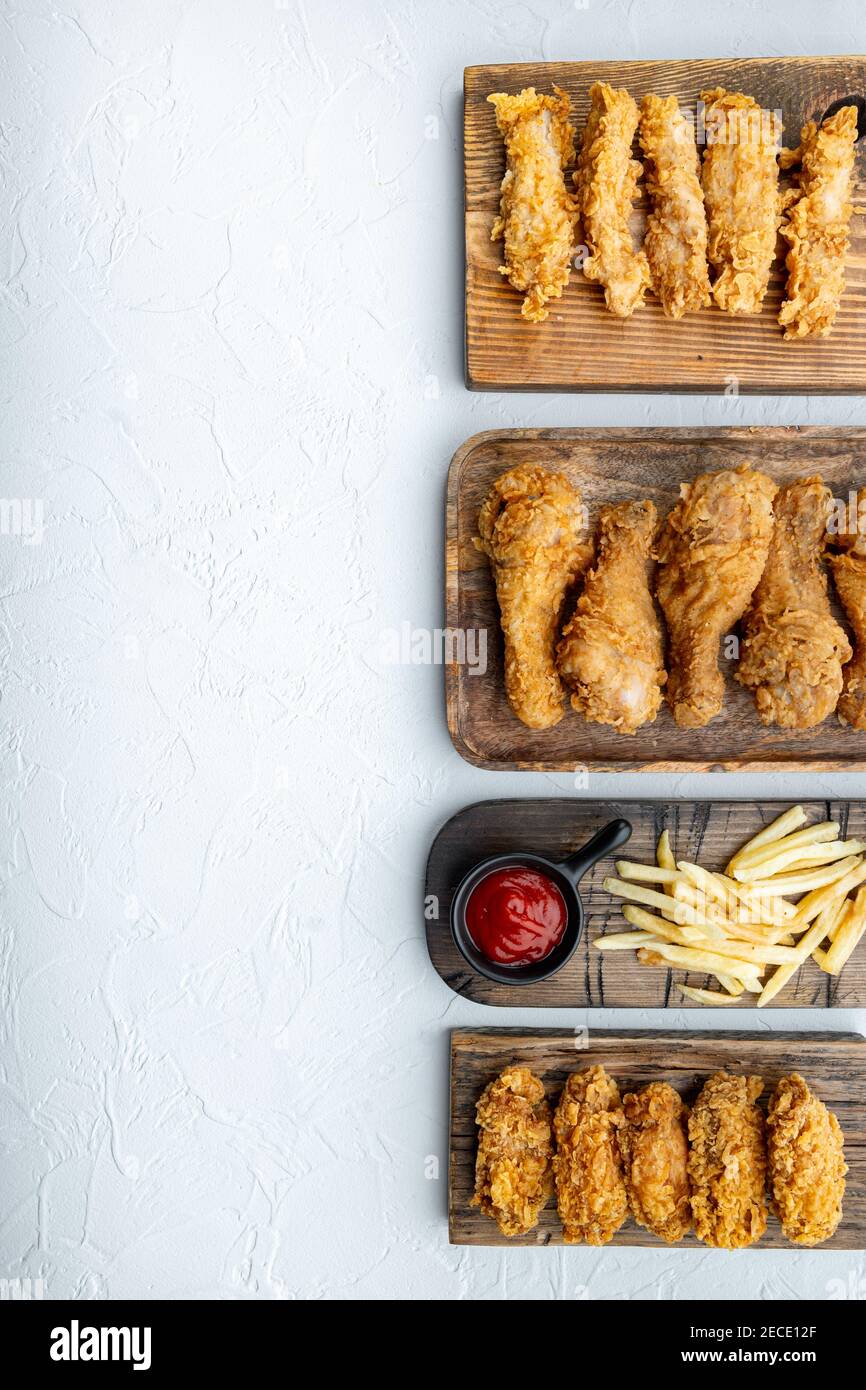 Crispy kentucky fried chicken cuts on white background, top view, with ...