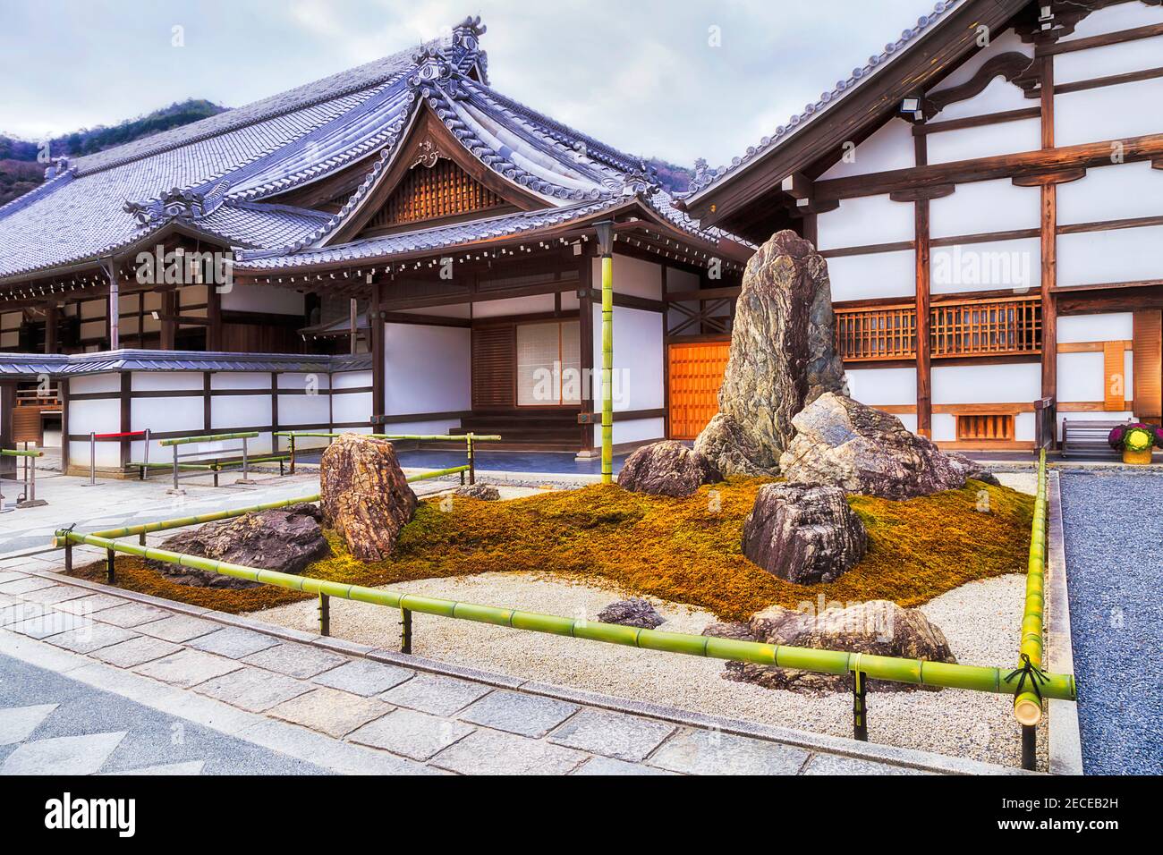 Stone garden at the entrance to traditional Japanese Buddhist temple in ancient city Kyoto. Stock Photo