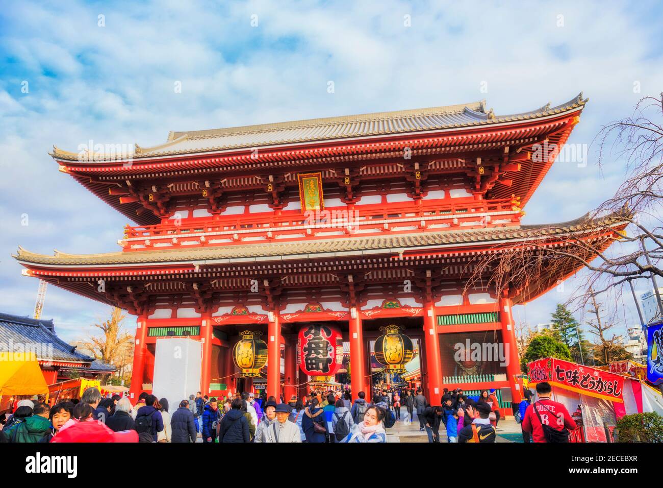 Tokyo, Japan - 2 January 2020: Senso Ji shinto temple main gate and temple with unrecognisable crowd of people. Stock Photo