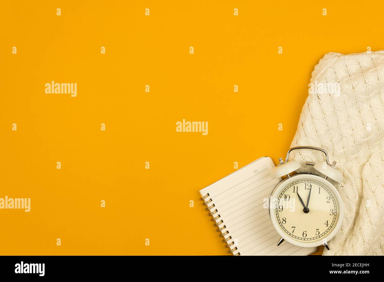 Flat lay yellow workplace or workspace table or desk with notepad, copy space composition, design for website's photo Stock Photo