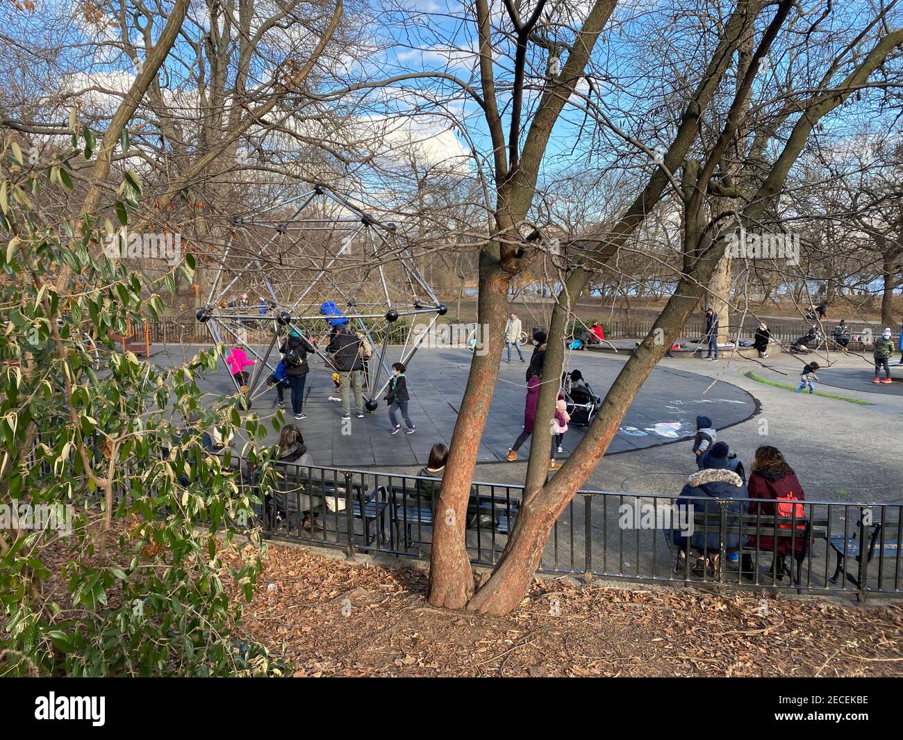 Parents and children get some fresh air at the Vanderbilt Playground in Prospect Park during the Covid-19 Pandemic when there are not many places to g Stock Photo