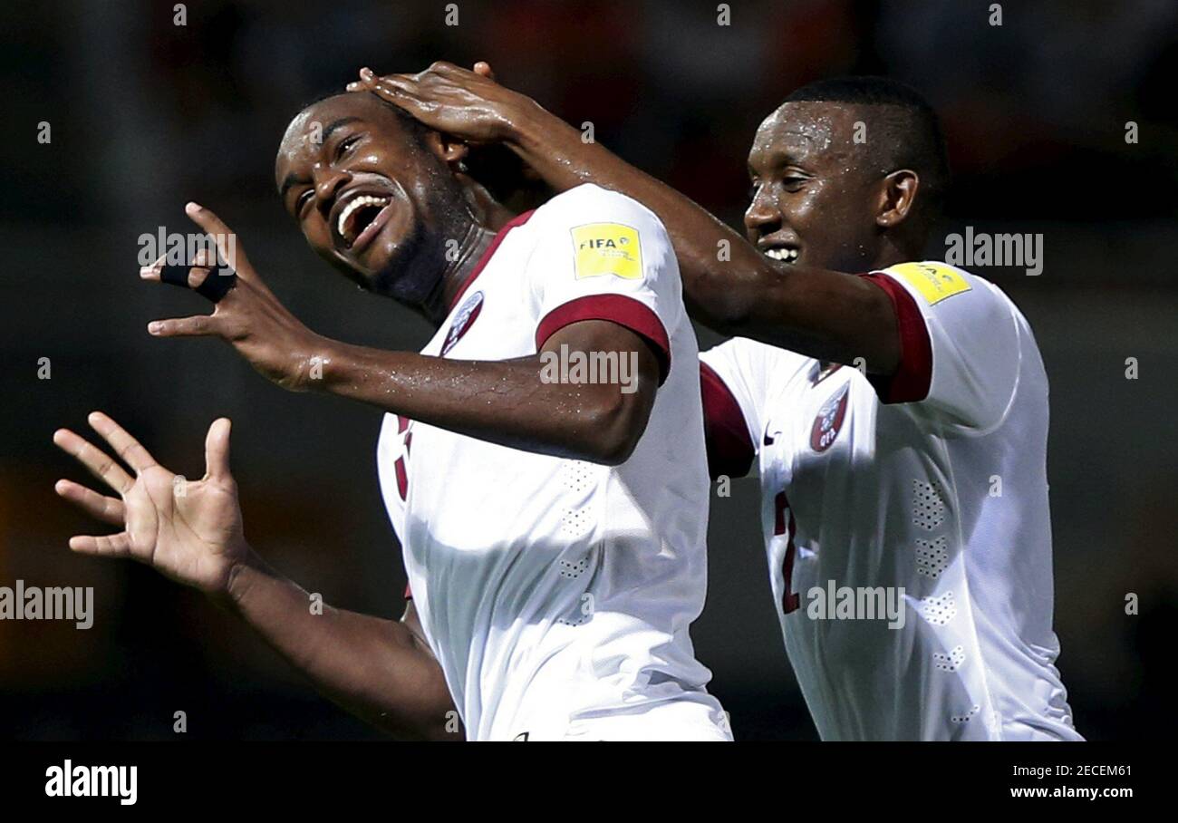Qatar's Abdelkarim Hassan (L) celebrates with Mohamed Musa after Hassan scored a goal against Hong Kong during their World Cup qualifying match in Hong Kong, China September 8, 2015.      REUTERS/Bobby Yip   Picture Supplied by Action Images Stock Photo