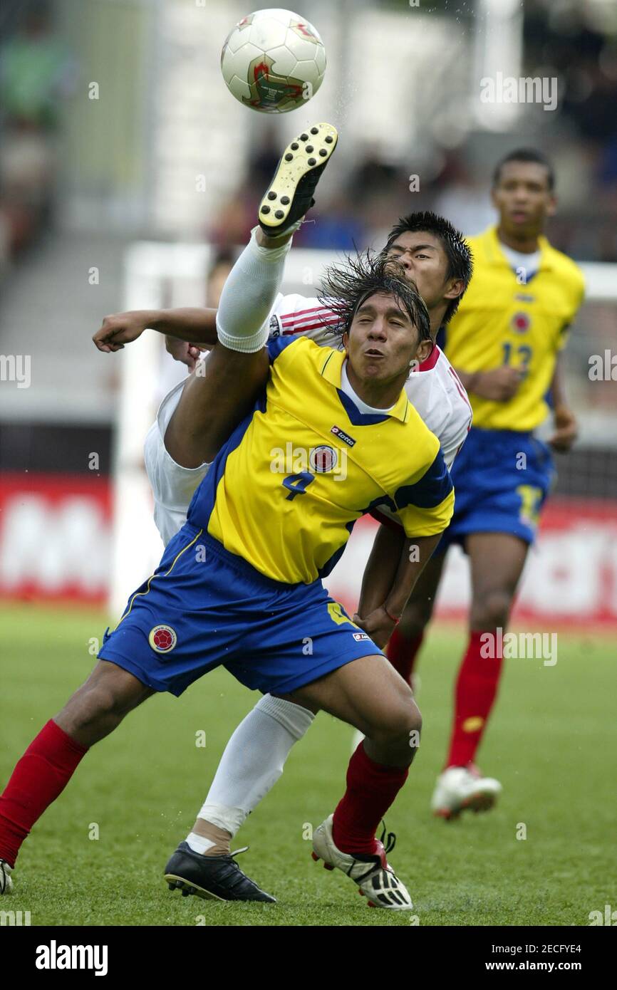 U17 World Cup, Helsinki, Finland, Aug 16 2003. Colombia 2 China 1. Victor Vargas, Chen Jiang Stock Photo