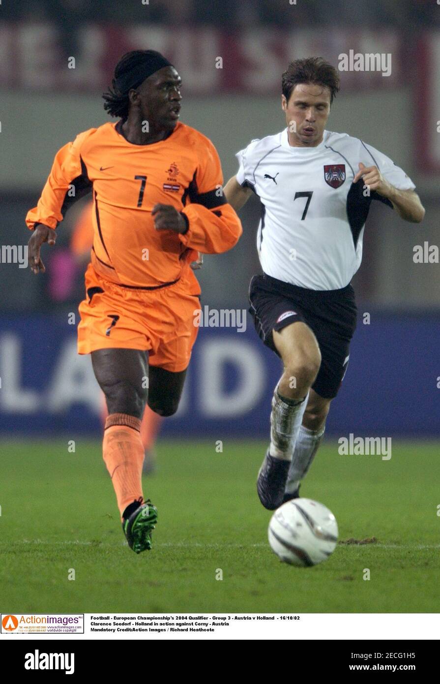 Football - European Championship's 2004 Qualifier - Group 3 - Austria v Holland  - 16/10/02  Clarence Seedorf - Holland in action against Harald Cerny - Austria  Mandatory Credit:Action Images / Richard Heathcote Stock Photo