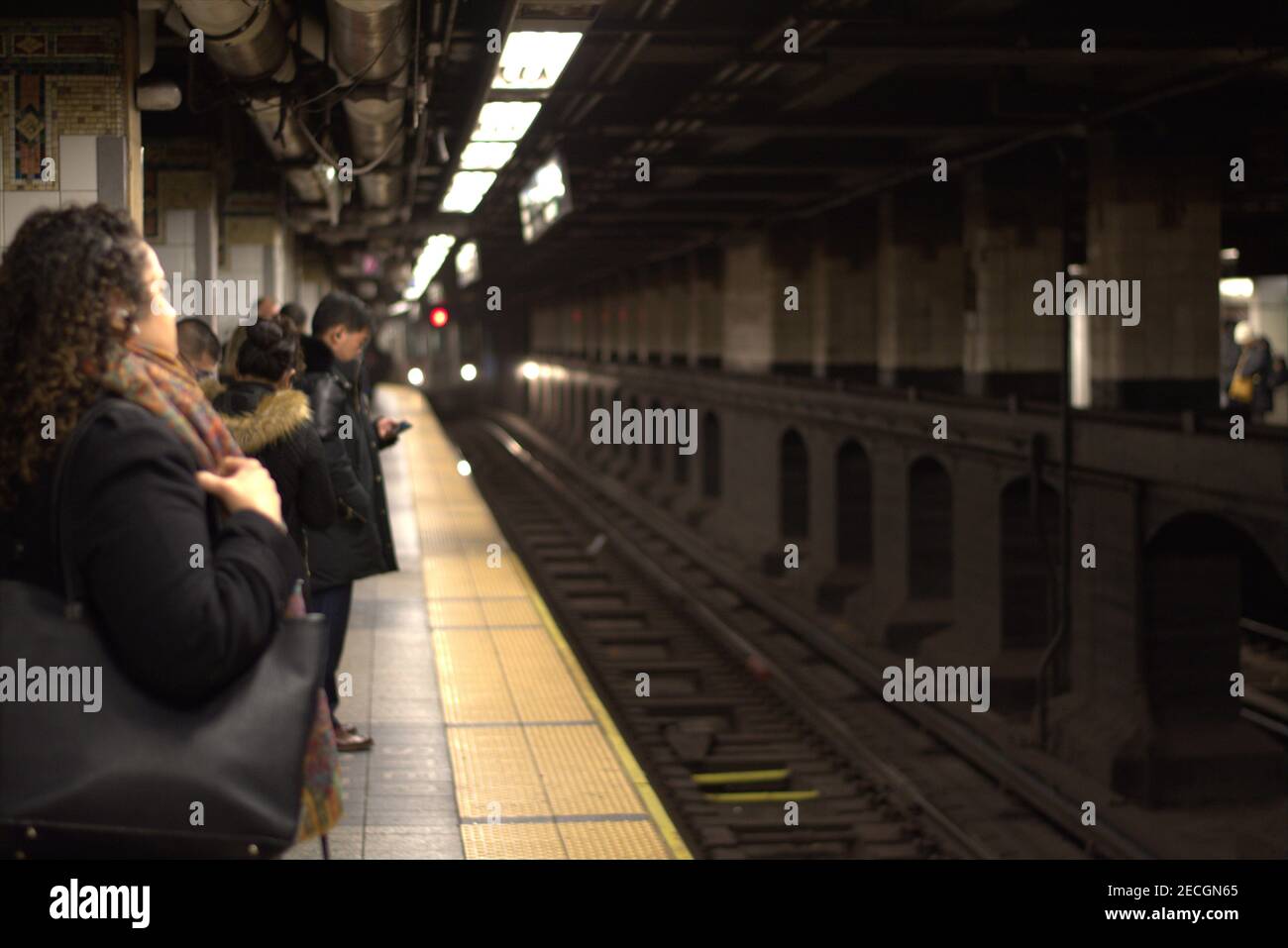 The platform bystanders at the Grand Central station in Midtown Manhattan, New York. Stock Photo