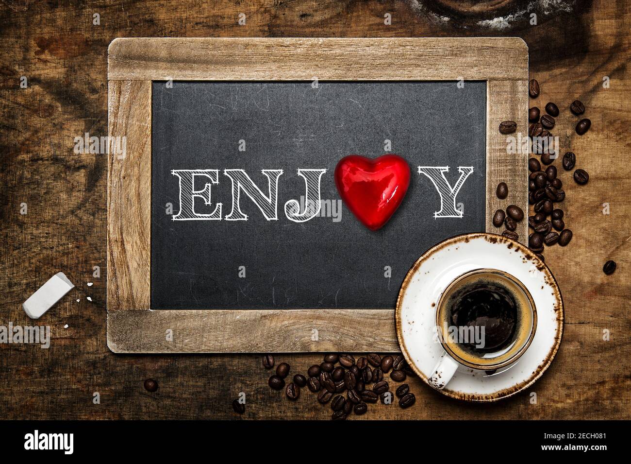Coffee and vintage chalkboard. Red heart. Enjoy concept Stock Photo