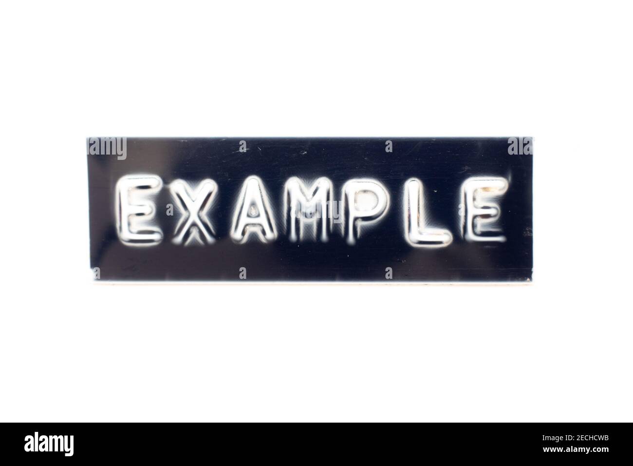 Embossed letter in word example on black banner with white background