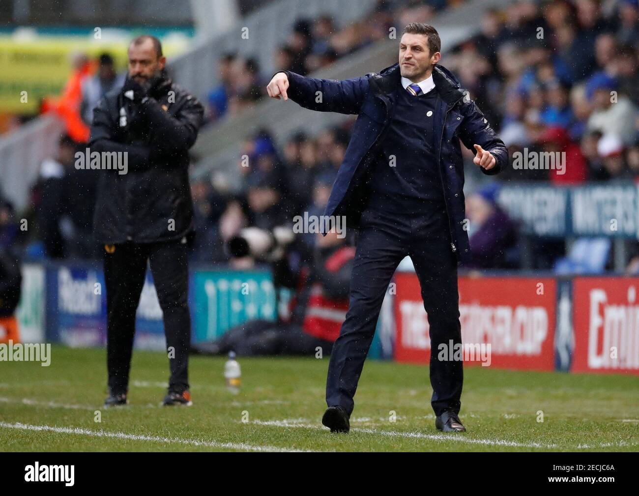Soccer Football - FA Cup Fourth Round - Shrewsbury Town v Wolverhampton Wanderers  - Montgomery Waters Meadow, Shrewsbury, Britain - January 26, 2019  Woking manager Alan Dowson and Shrewsbury Town manager Sam Ricketts during the match       Action Images via Reuters/Carl Recine Stock Photo