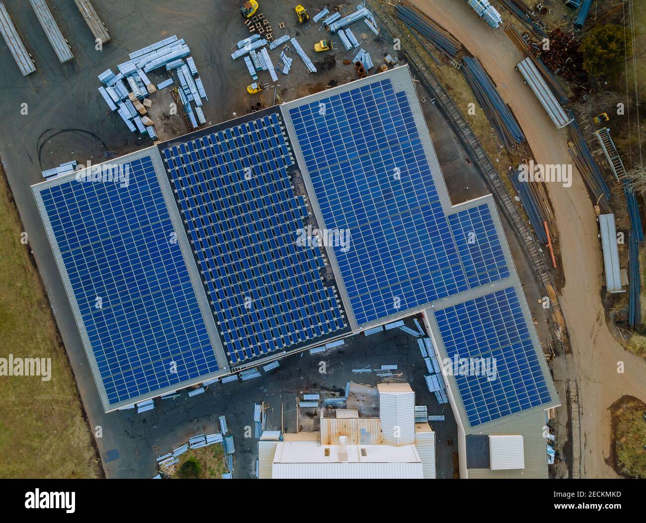 Aerial view on of solar panels installed in roof industrial warehouse