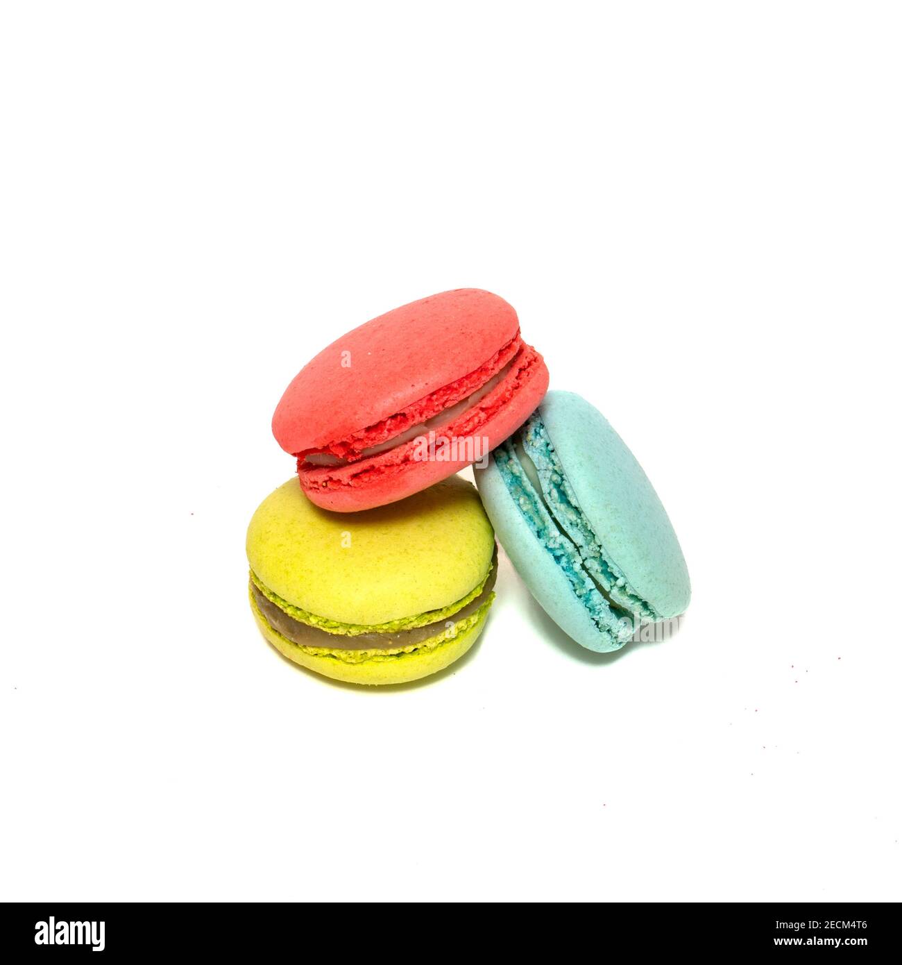 Macaroons isolated in white background. Colorful french macarons close-up. Tasty sweet color macaroon, bakery concept. Stock Photo