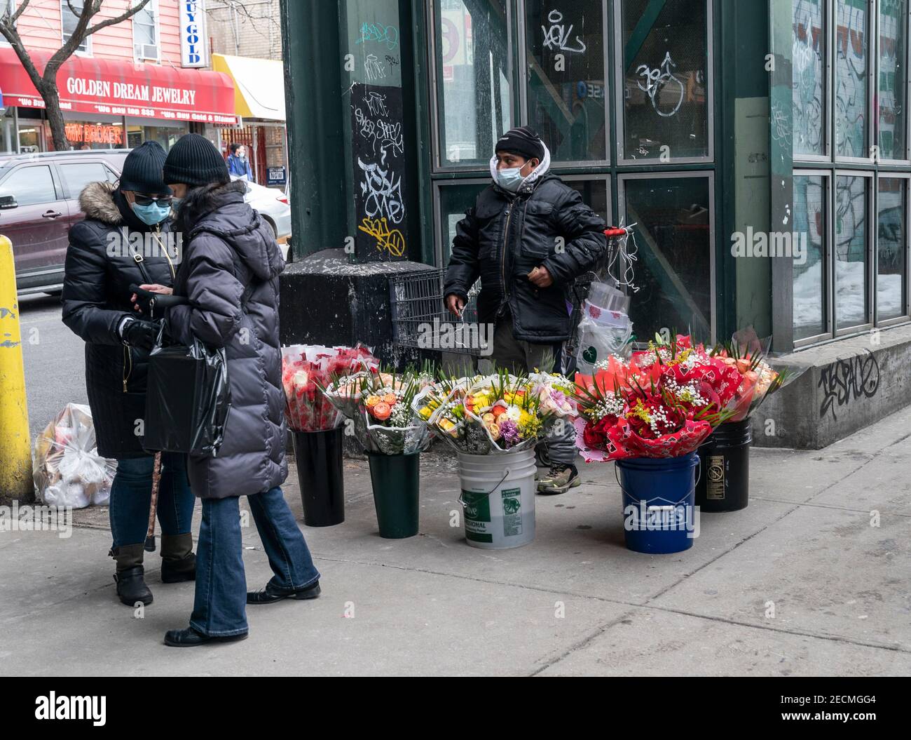 New York, NY - February 13, 2021: Vendor selling flowers for Valentines Day on the street in Kingsbridge section of the Bronx Stock Photo