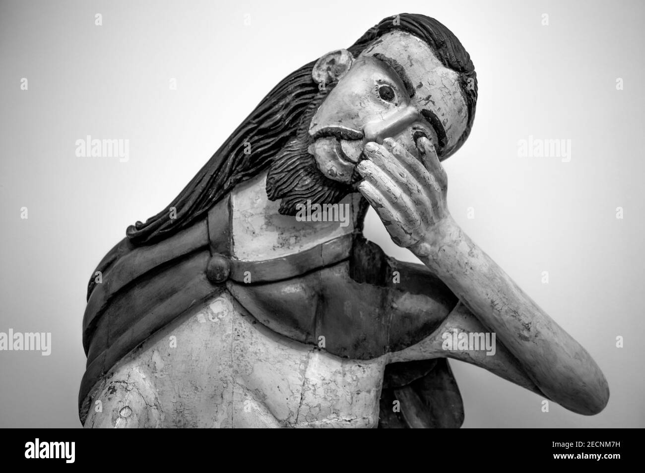 The State Russian Museum. Wooden figurine of Jesus Christ on a white background. Black and white Stock Photo