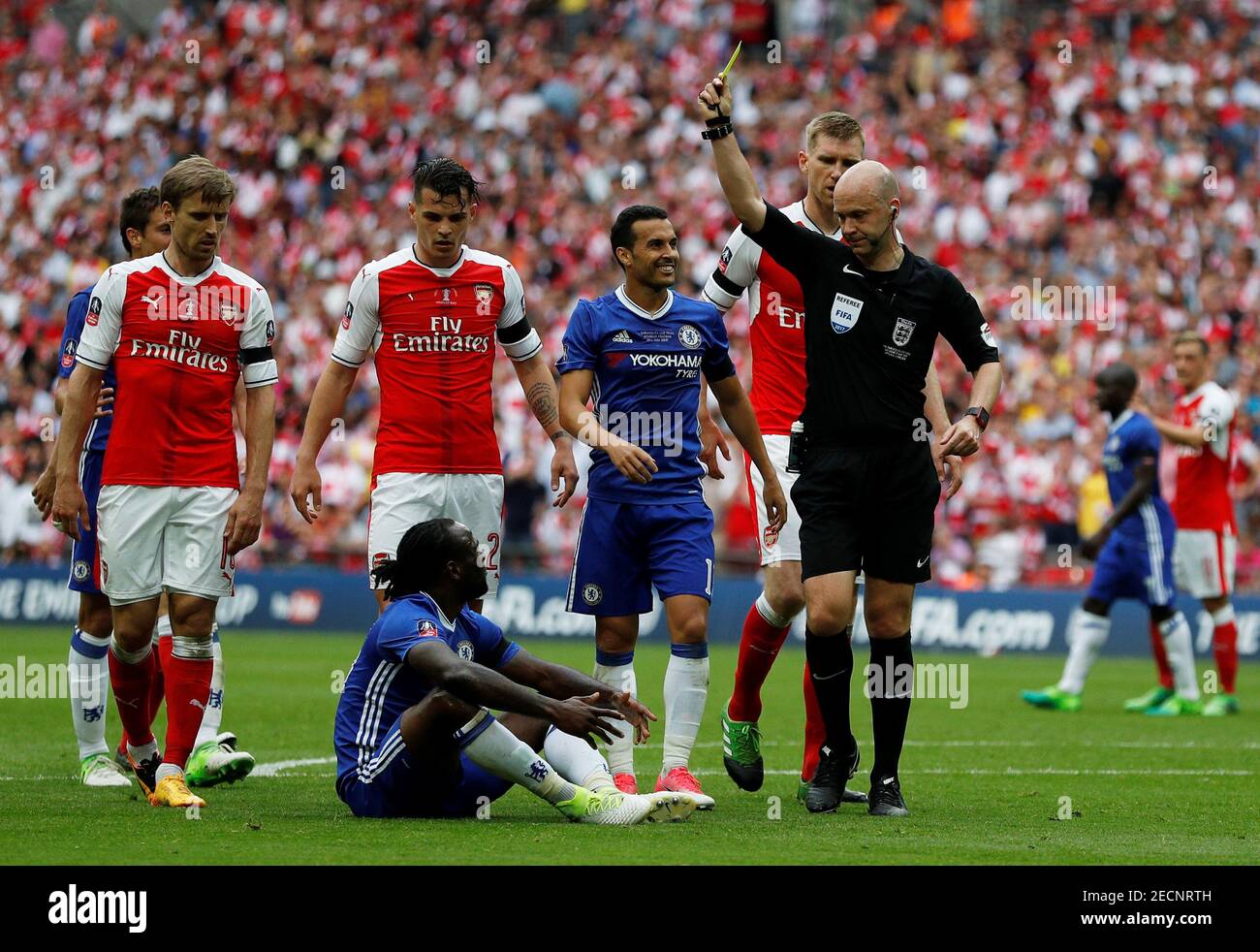 Britain Soccer Football - Arsenal v Chelsea - FA Cup Final - Wembley  Stadium - 27/5/17 Chelsea's Victor Moses is shown a second yellow card by  referee Anthony Taylor for simulation resulting
