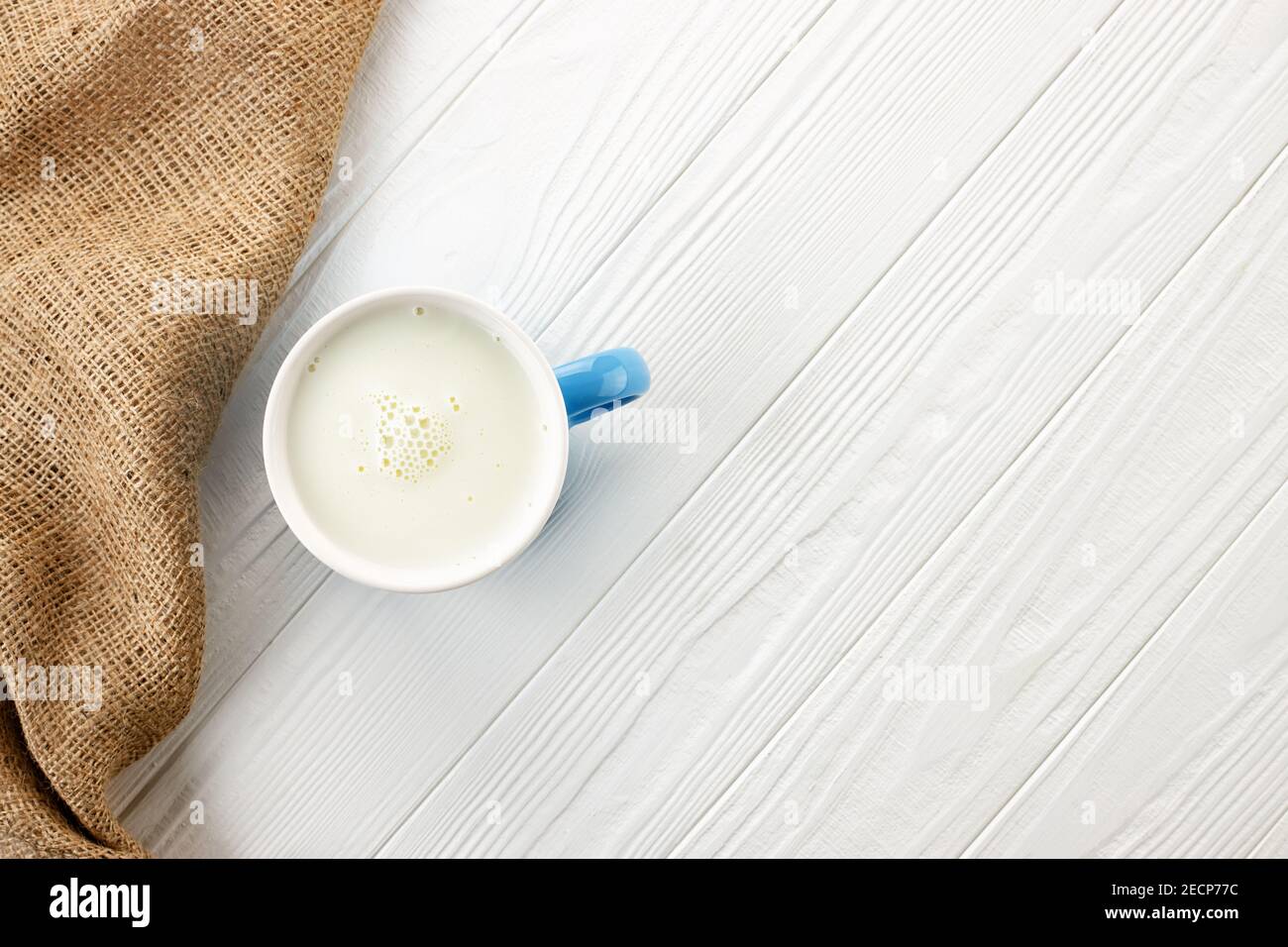 milk in blue cup Stock Photo