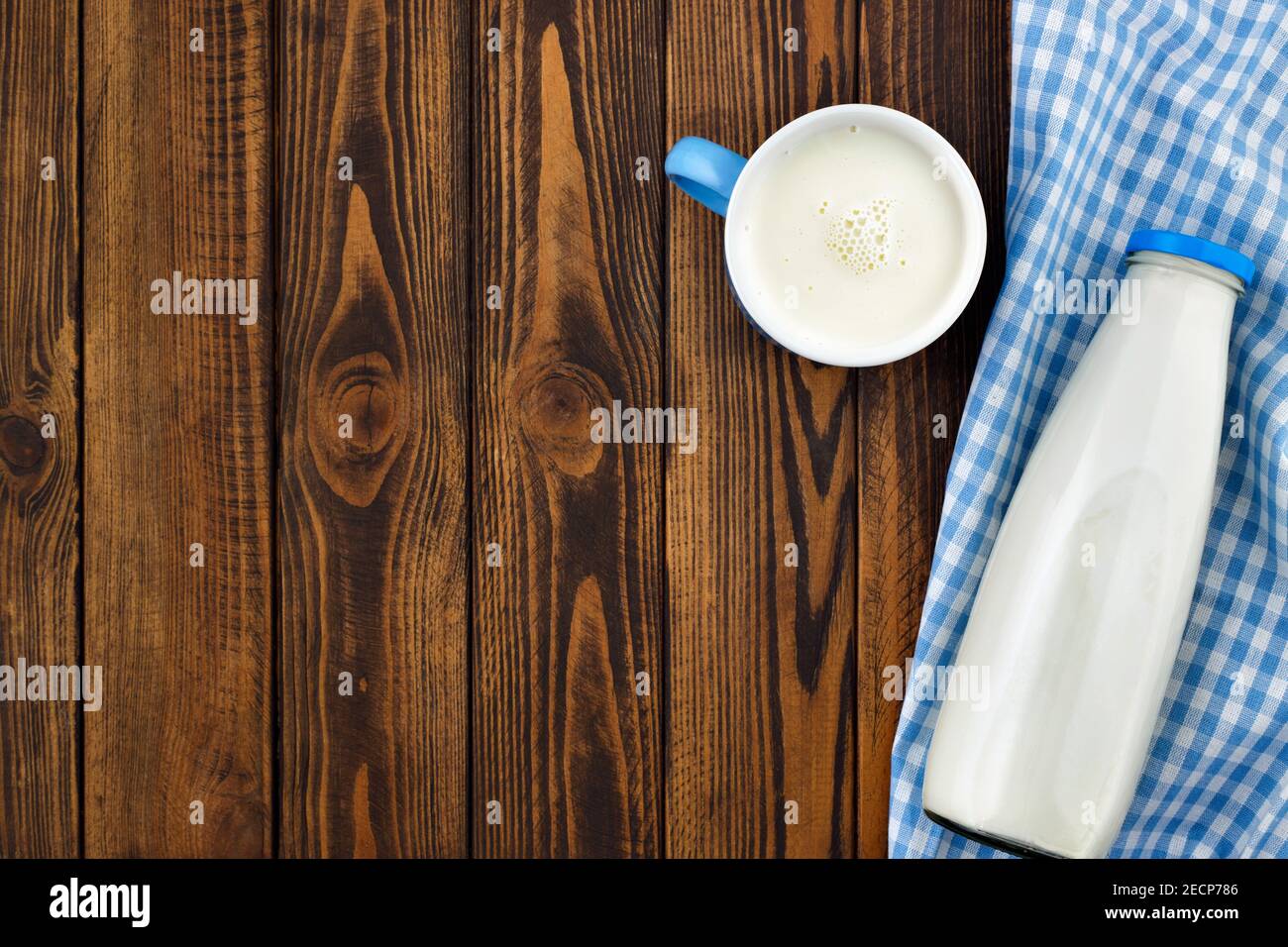 milk in glass bottle and cup Stock Photo
