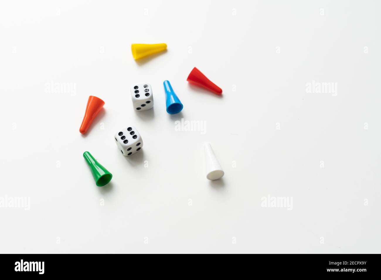 Game cubes, chips, hourglass on a white background. The concept of home Board games, classes at home with children, developmental training, logic Stock Photo