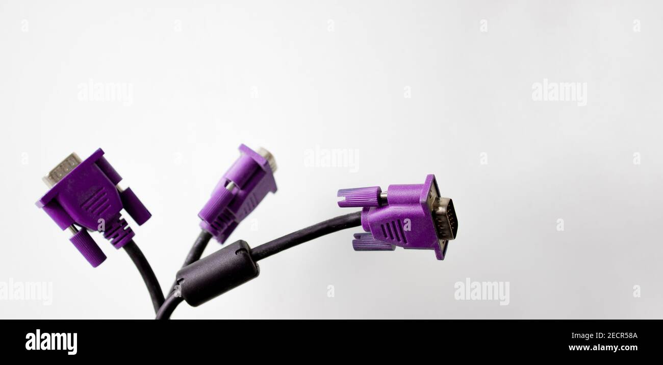 three purple computer jack plug for monitor isolated on white