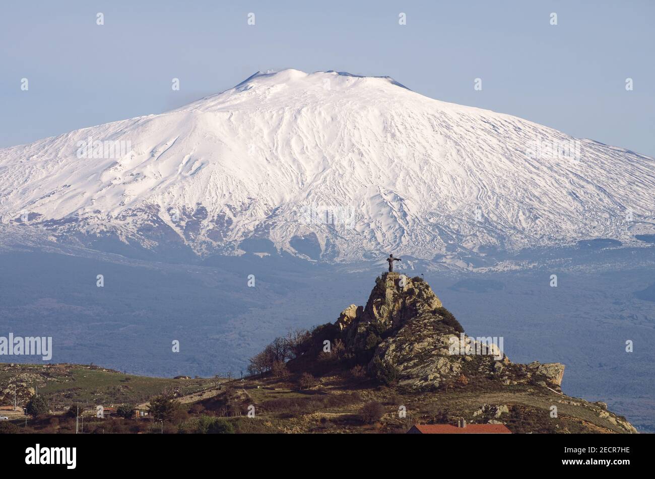 Etna in Sicily mountain summit snow capped statue 'Cristo Signore della Montagna' on rock in Cesarò town of Nebrodi Park Stock Photo