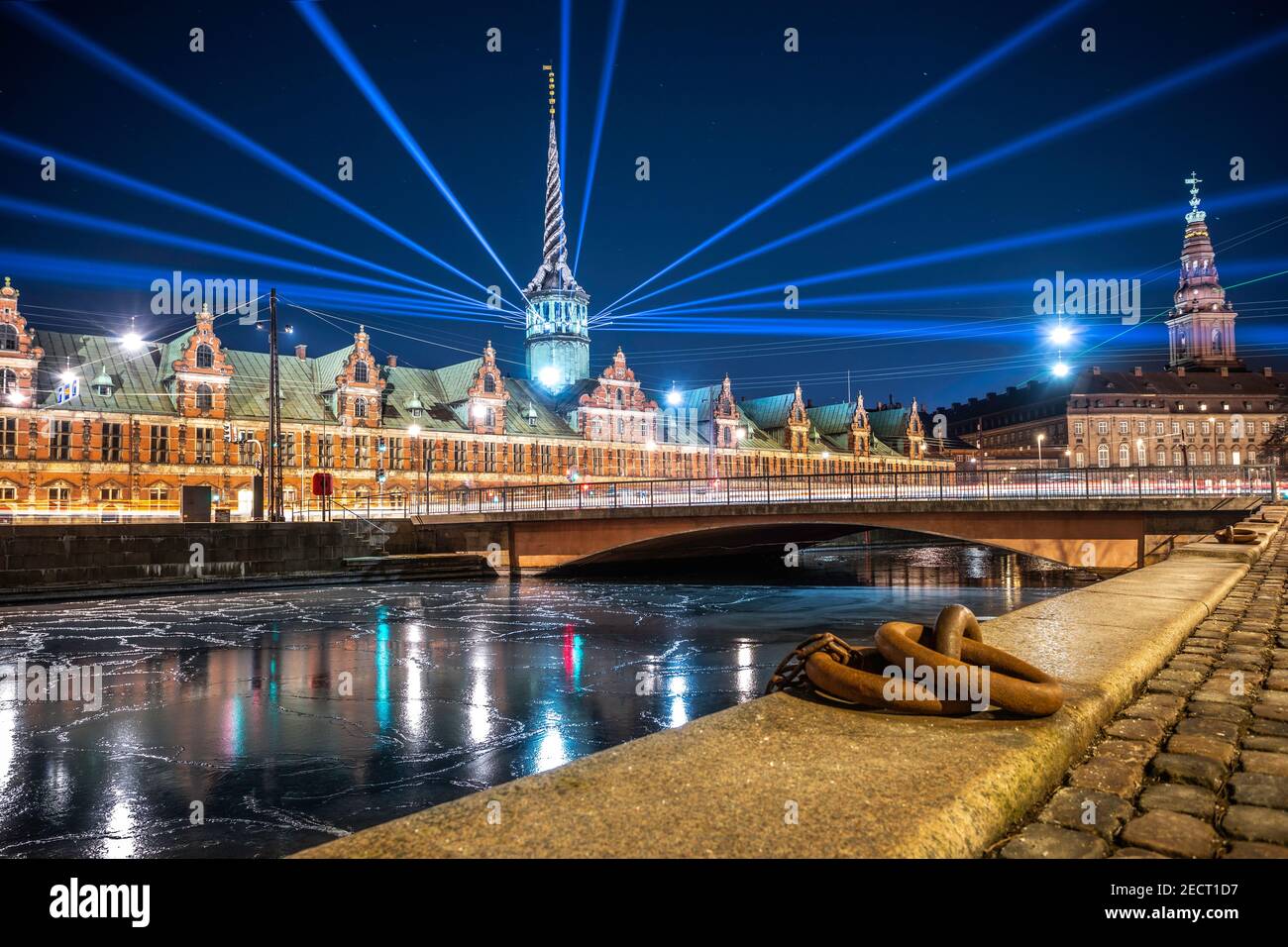 Copenhagen lights festival at night with lights mounted on Børsen tower and frozen canal, Denmark Stock Photo