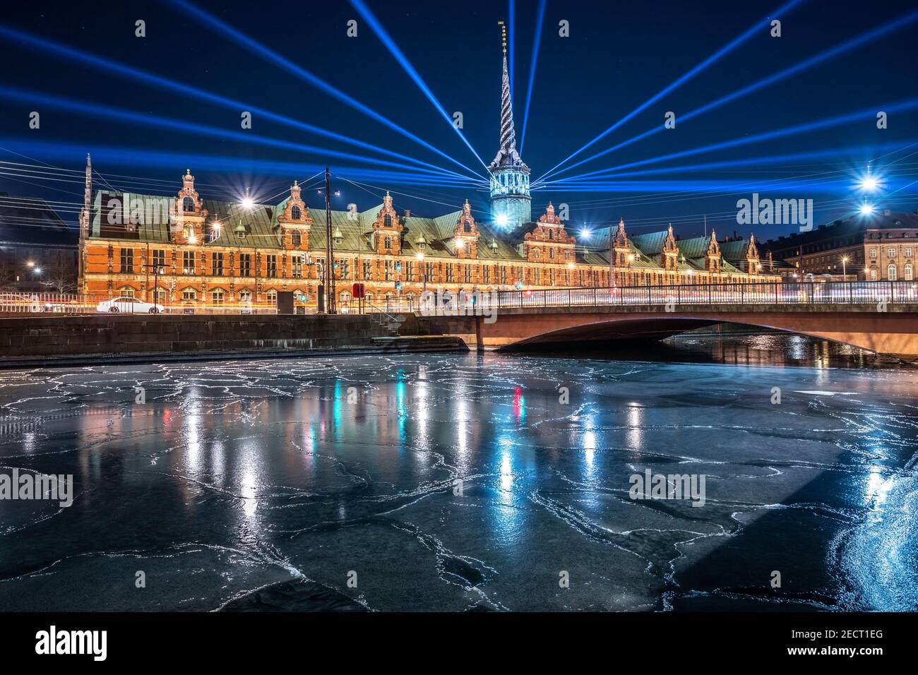Copenhagen lights festival at night with lights mounted on Børsen tower and frozen canal, Denmark Stock Photo