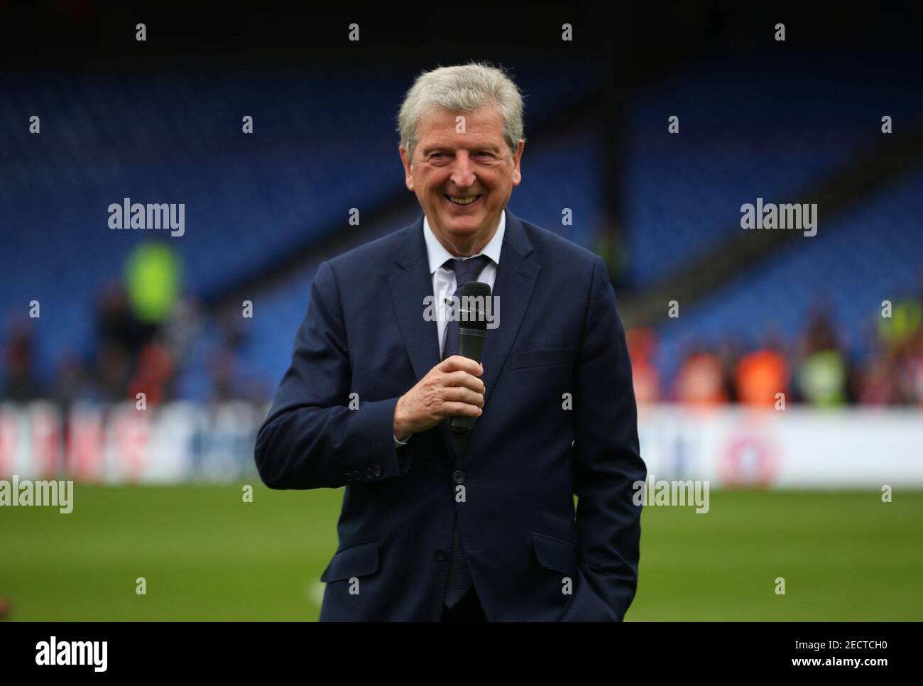 Soccer Football - Premier League - Crystal Palace vs West Bromwich Albion - Selhurst Park, London, Britain - May 13, 2018 Crystal Palace manager Roy Hodgson speaks to the crowd before presenting an award to Commentator John Motson REUTERS/Hannah McKay EDITORIAL USE ONLY. No use with unauthorized audio, video, data, fixture lists, club/league logos or "live" services. Online in-match use limited to 75 images, no video emulation. No use in betting, games or single club/league/player publications. Please contact your account representative for further details. Stock Photo