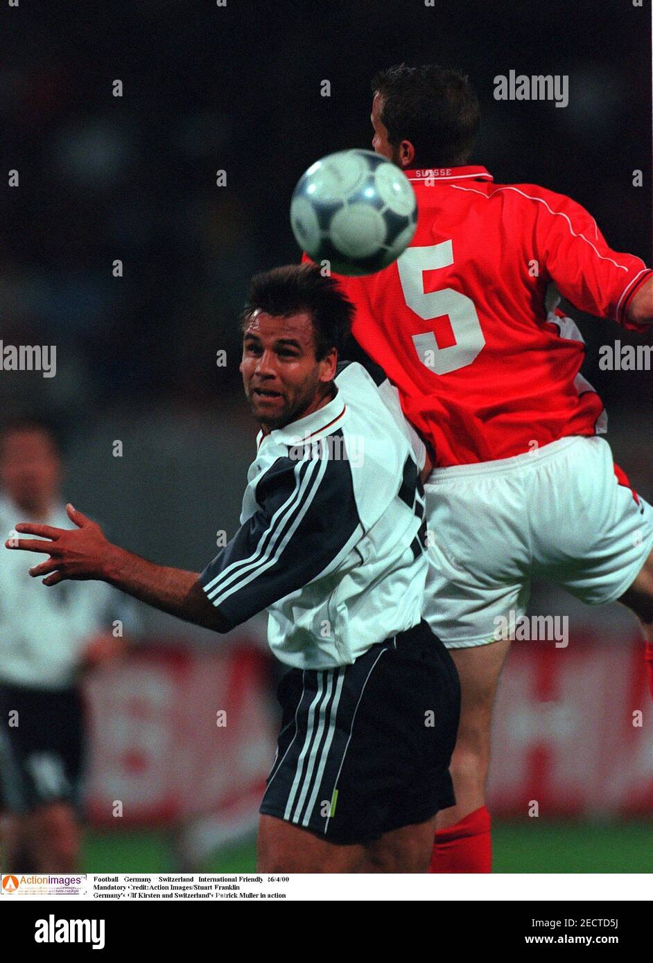 Football - Germany v Switzerland , International Friendly 26/4/00 Mandatory  Credit:Action Images/Stuart Franklin Germany's Ulf Kirsten and Switzerland's  Patrick Muller in action Stock Photo - Alamy