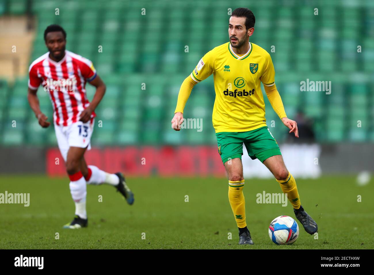Mario Vrancic of Norwich City and Mikel John Obi of Stoke City - Norwich City v Stoke City, Sky Bet Championship, Carrow Road, Norwich, UK - 13th February 2021  Editorial Use Only - DataCo restrictions apply Stock Photo