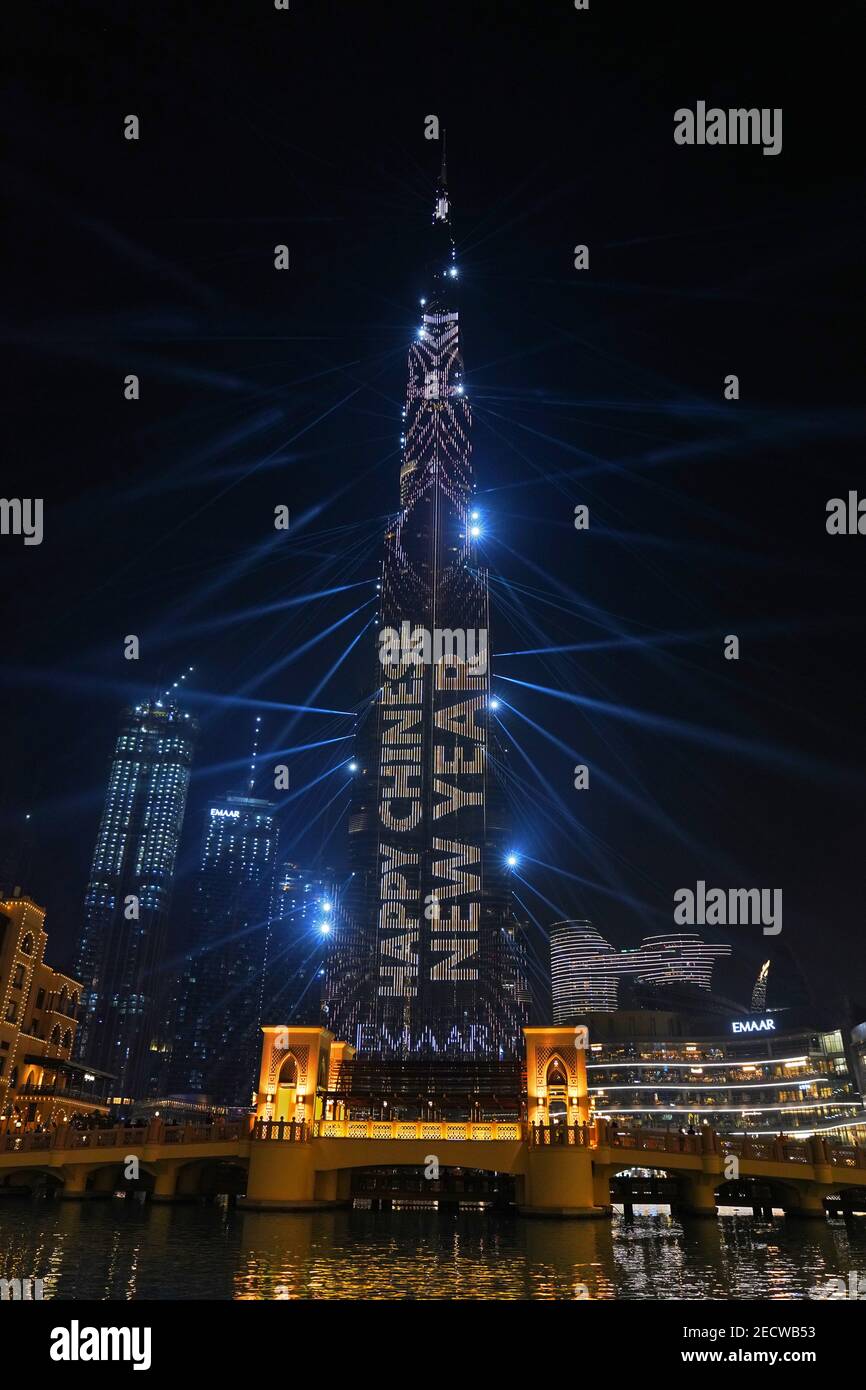 Beijing, China. 14th Feb, 2021. A light is staged at Burj Khalifa, the world's tallest building, to celebrate the Chinese Lunar New Year in Dubai, the United Arab Emirates (UAE), Feb.